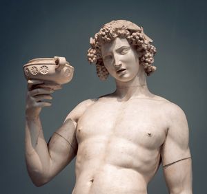 dionysus-bacchus-wine-statue-portrait-600nw-422329522.jpg
